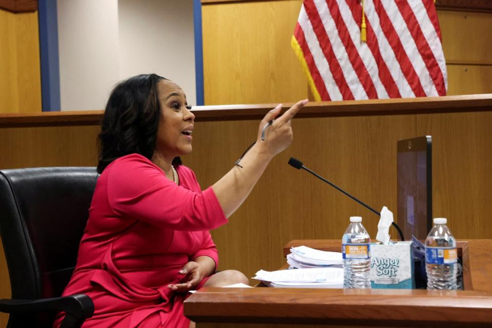 Fulton County District Attorney Fani Willis testifies at a hearing on 15 February about allegations involving her relationship with another prosecutor. (REUTERS)