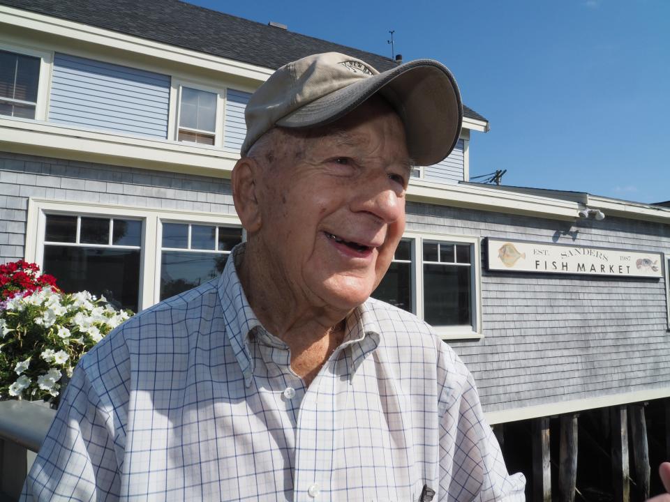 Harold Whitehouse, a longtime Portsmouth South End resident, smiles and laughs during the official dedication of the the Harold "Whitey" Whitehouse Bridge on South Street in 2018.