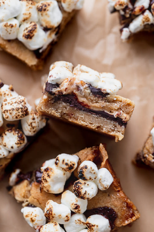 <p>Stephanie's Sweets</p><p>These S'mores cookie bars have a graham cracker cookie base. They have layers of quality chocolate bars and mini marshmallows.</p><p><strong>Get the recipe: <a href="https://stephaniessweets.com/smores-cookie-bars/" rel="nofollow noopener" target="_blank" data-ylk="slk:S'mores Cookie Bars;elm:context_link;itc:0;sec:content-canvas" class="link rapid-noclick-resp">S'mores Cookie Bars</a></strong></p>