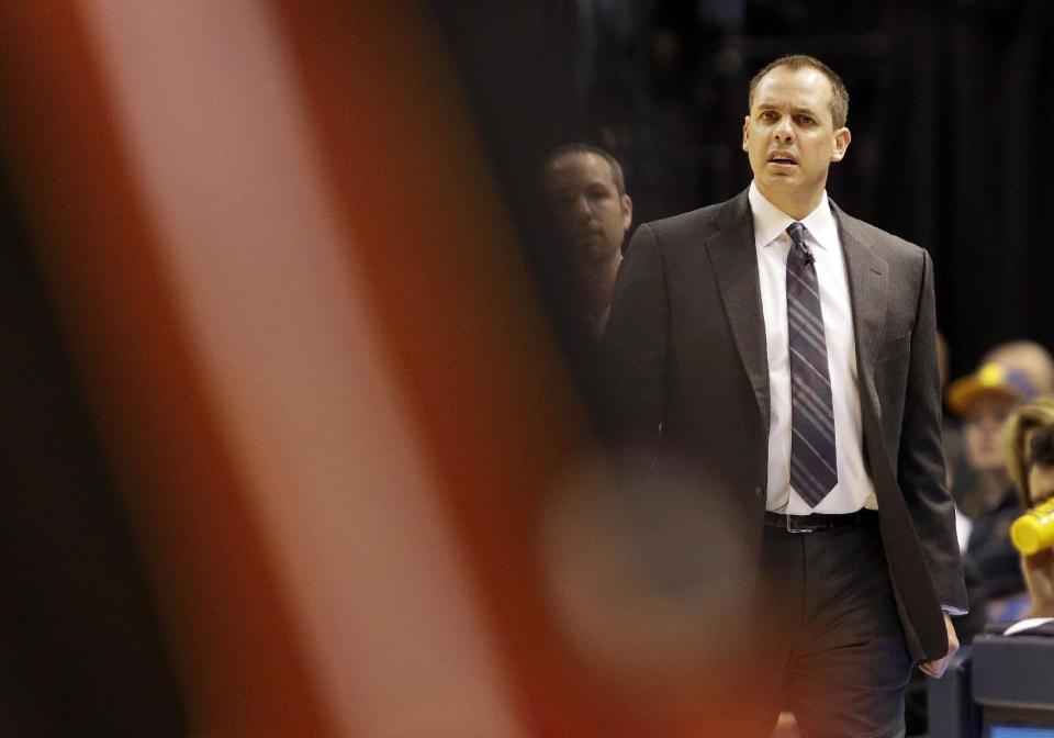 Indiana Pacers head coach Frank Vogel watches from the sideline during the first half of an NBA basketball game against the Miami Heat in Indianapolis, Wednesday, March 26, 2014. The Pacers won 84-83. (AP Photo/AJ Mast)