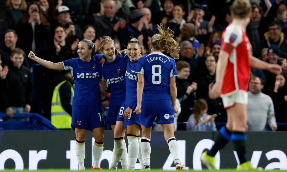 <span>Sjoeke Nüsken (second left) celebrates with her teammates after scoring Chelsea’s third goal.</span><span>Photograph: Nigel French/PA</span>