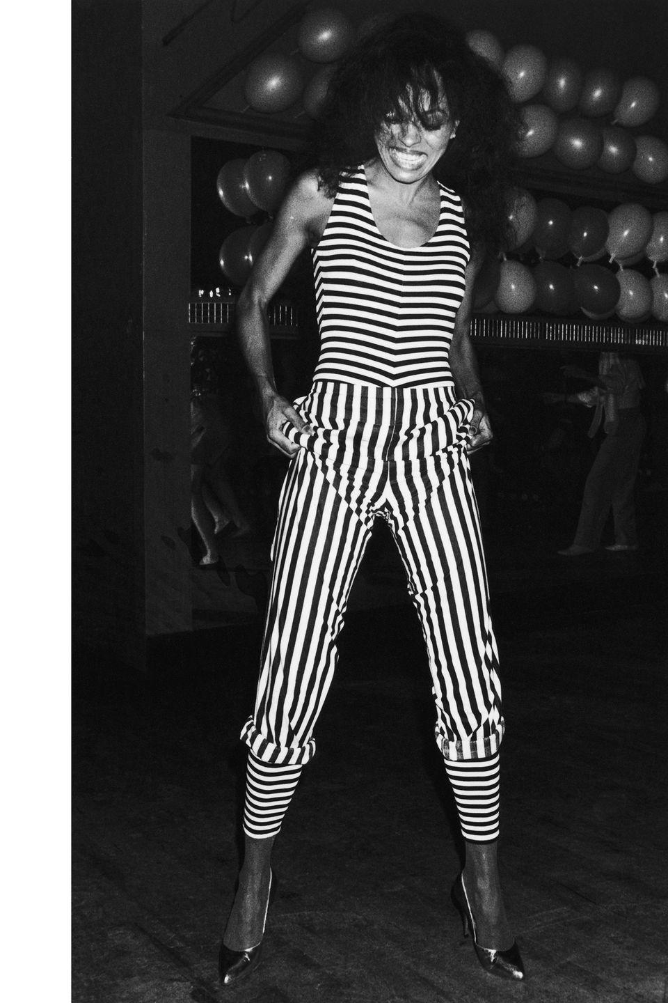 <p>Diana Ross in a striped jumpsuit for a night out at the Embassy Nightclub in London. </p>