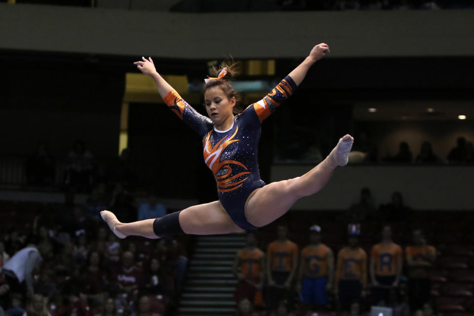 BIRMINGHAM, AL - JANUARY 29:      Auburn Tigers Samantha Cerio performs on the balance beam at the Elevate the Stage Meet between the Auburn Tigers and the Alabama Crimson Tide.  Alabama defeated Auburn by the score of 195.850 to 194.675  on January 29, 2017, at the Legacy Arena in Birmingham, Alabama.  (Photo by Michael Wade/Icon Sportswire via Getty Images)