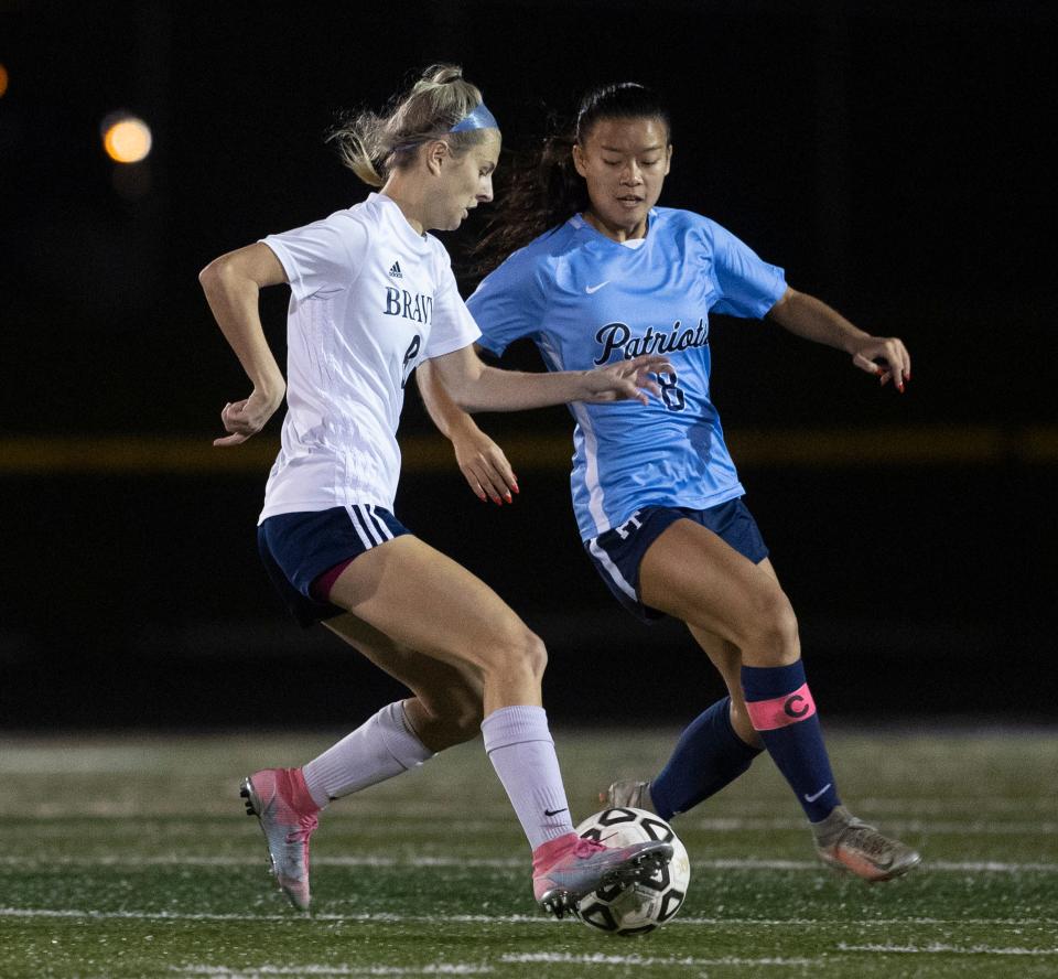 Manalapan's Vanessa Sarf (white jersey) in a 2022 game.