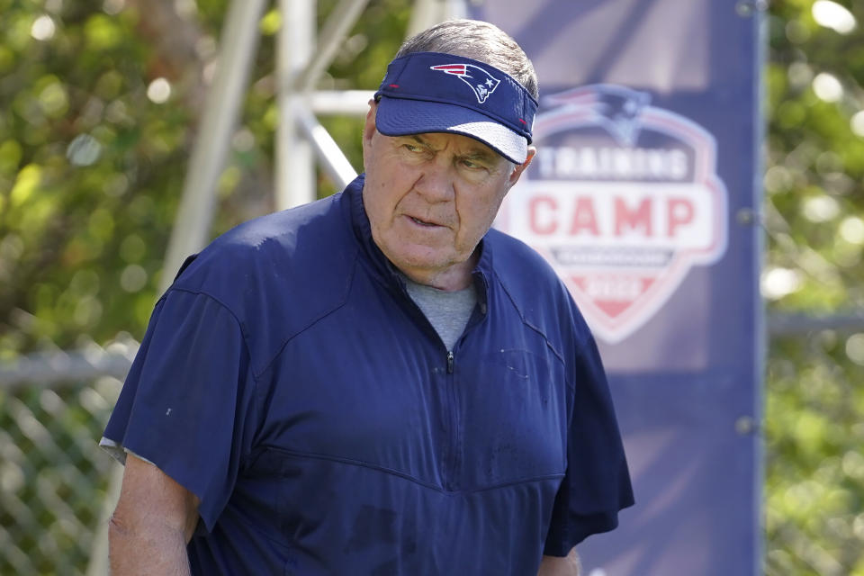 New England Patriots head coach Bill Belichick steps on the field during the NFL football team's training camp, Wednesday, Aug. 3, 2022, in Foxborough, Mass. (AP Photo/Steven Senne)