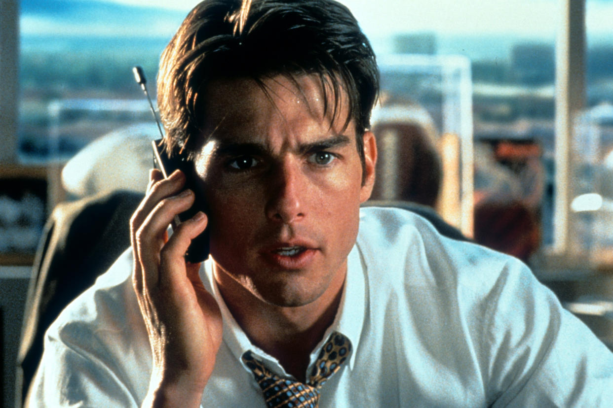 Tom Cruise talks on a phone in a scene from the film 'Jerry Maguire', 1996. (Photo by TriStar/Getty Images)