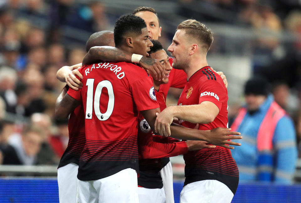 Manchester United’s Marcus Rashford (left) celebrates scoring his side’s first goal of the game