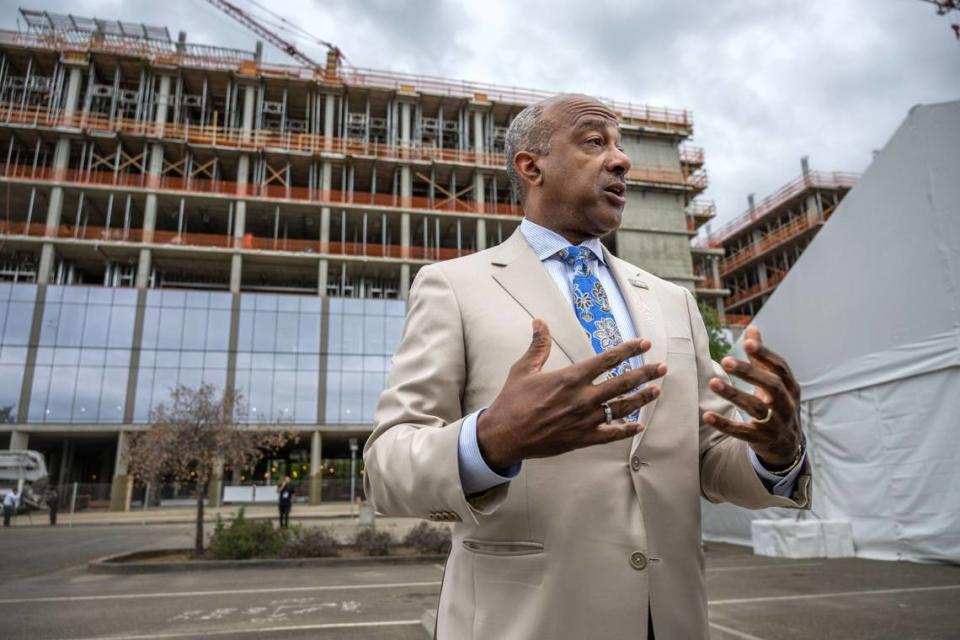 UC Davis Chancellor Gary May talks about the progress of Aggie Square on Thursday during a “topping off” ceremony for the project’s first phase of construction, which includes the Lifelong Learning and Life Science Technology and Engineering East buildings dedicated to classrooms and public programs.