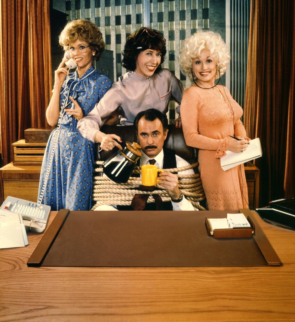 Jane Fonda, Lily Tomlin, Dolly Parton and Dabney Coleman starred in the workplace comedy "9 to 5," released in 1980.