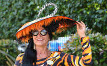 <p>A racegoer attends the first day off Royal Ascot 2017 at Ascot Racecourse on June 20, 2017 in Ascot, England. (Anwar Hussein/WireImage via Getty Images) </p>