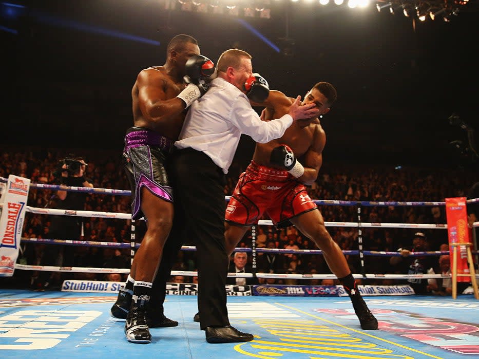 <p>Anthony Joshua defeats Dillian Whyte in a high-risk fight in 2015</p>Getty