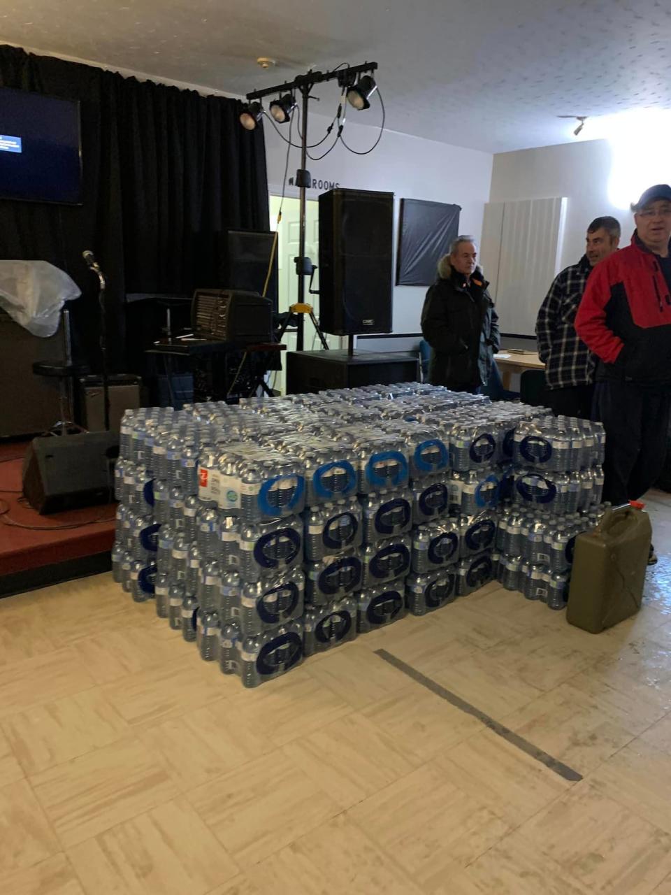 Cases of water were donated by Walmart and Dominion and delivered to the Barachois Brook community centre. 