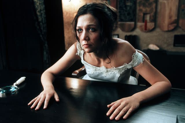 <p>Mary Evans/LION'S GATE FILMS/Ronald Grant/Everett Collection</p> Maggie Gyllenhaal in 'Secretary'