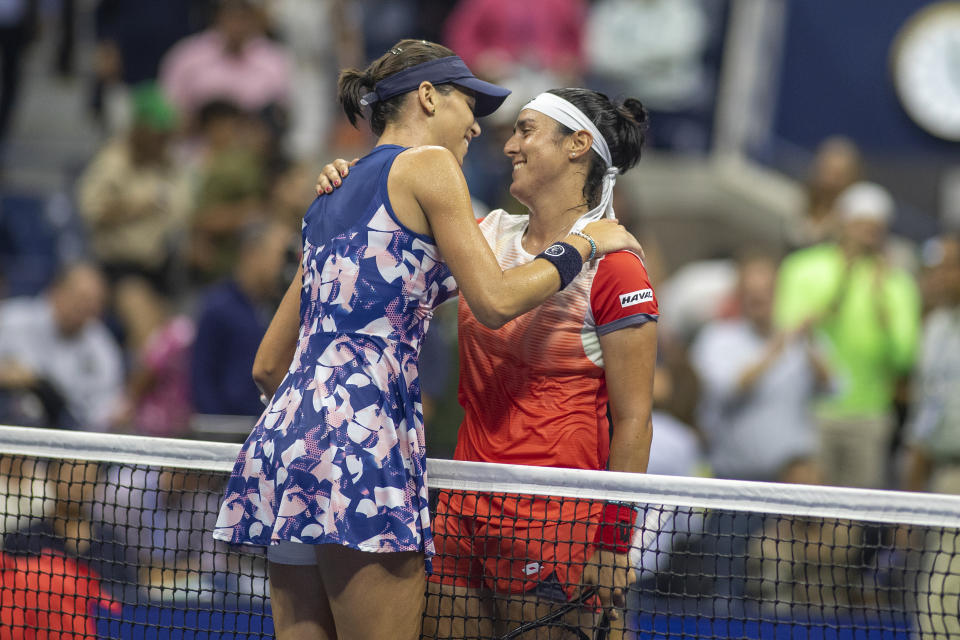 Ons Jabeur, pictured here being embraced at the net by Ajla Tomljanovic after their US Open clash.