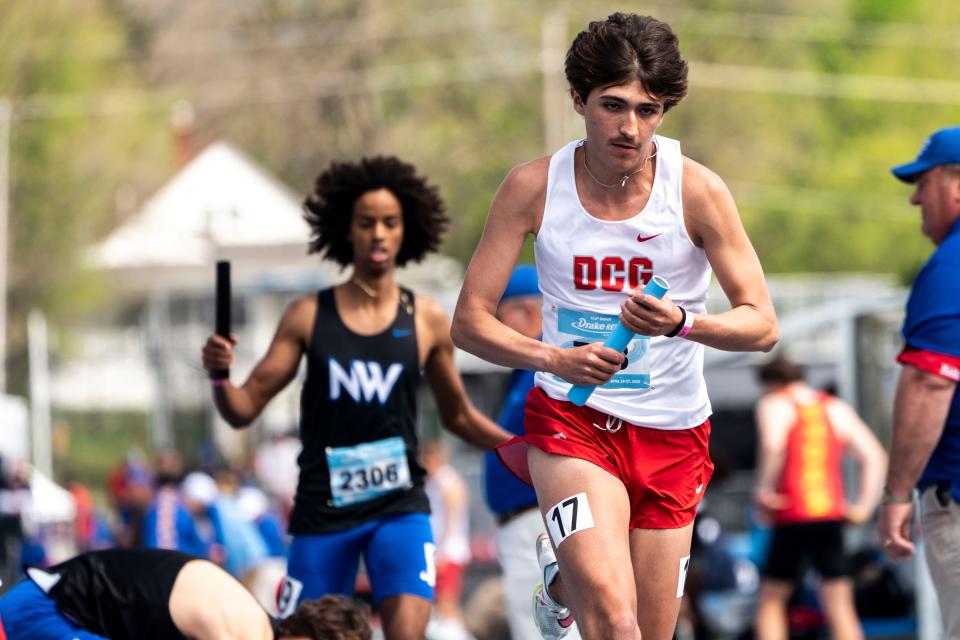 DCG's Sam Mora runs in the 4x800 meter relay during the Drake Relays at Drake Stadium on Saturday, April 27, 2024, in Des Moines.