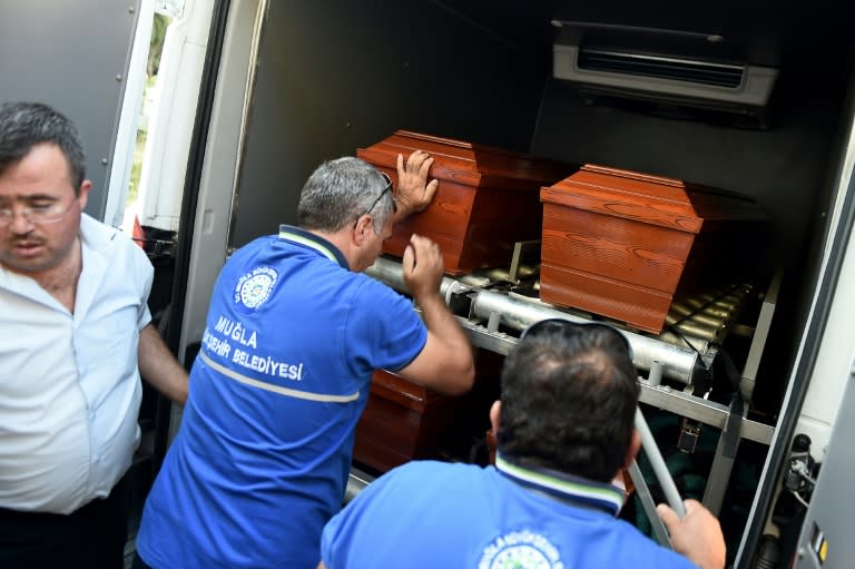 The coffin of drowned Syrian toddler Aylan Kurdi is loaded into a morgue in the Turkish town of Mugla, on September 3, 2015