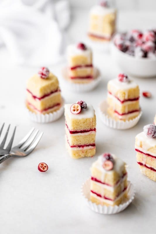 <p>Posh Little Designs</p><p>Light almond petit four cakes with layers of cranberry and vanilla bean frosting. Topped with a vanilla bean glaze and simple sugared cranberries. Dairy and gluten free.</p><p><strong>Get the recipe: <a href="https://poshlittledesigns.com/2020/12/03/cranberry-vanilla-bean-petit-fours-gluten-free/" rel="nofollow noopener" target="_blank" data-ylk="slk:Cranberry Vanilla Bean Petit Fours;elm:context_link;itc:0;sec:content-canvas" class="link rapid-noclick-resp">Cranberry Vanilla Bean Petit Fours</a></strong></p>