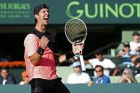 Mar 24, 2018; Key Biscayne, FL, USA; Thanasi Kokkinakis of Australia celebrates after match point against Roger Federer of Switzerland (not pictured) on day five of the Miami Open at Tennis Center at Crandon Park. Kokkinakis won 3-6, 6-3, 7-6(4). Mandatory Credit: Geoff Burke-USA TODAY Sports