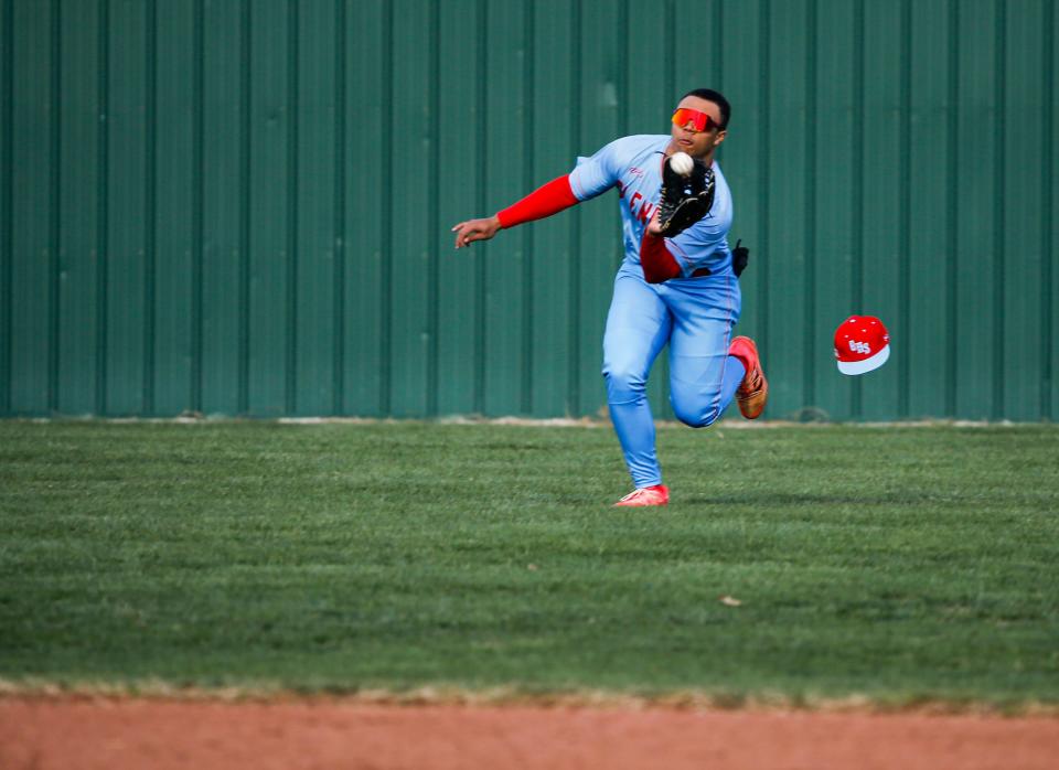 Glendale's Sebastian Norman catches a fly ball as the Falcons take on the McDonald County Mustangs on Monday, March 20, 2023.