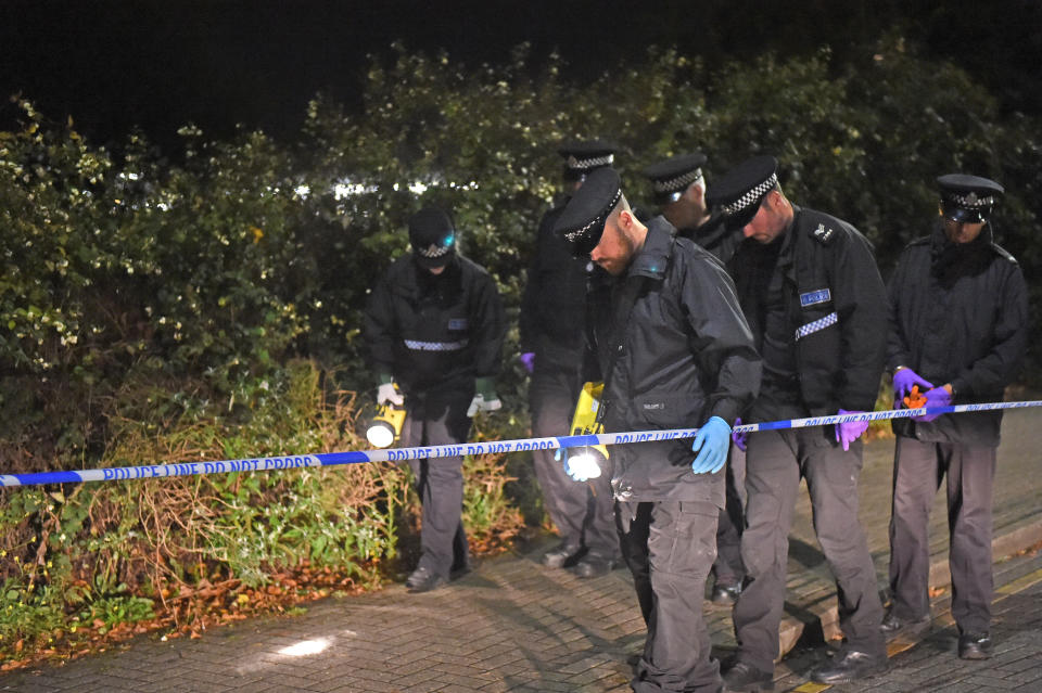 Police searching outside Hillingdon underground station in London, where a murder investigation has been launched after a man was stabbed to death.