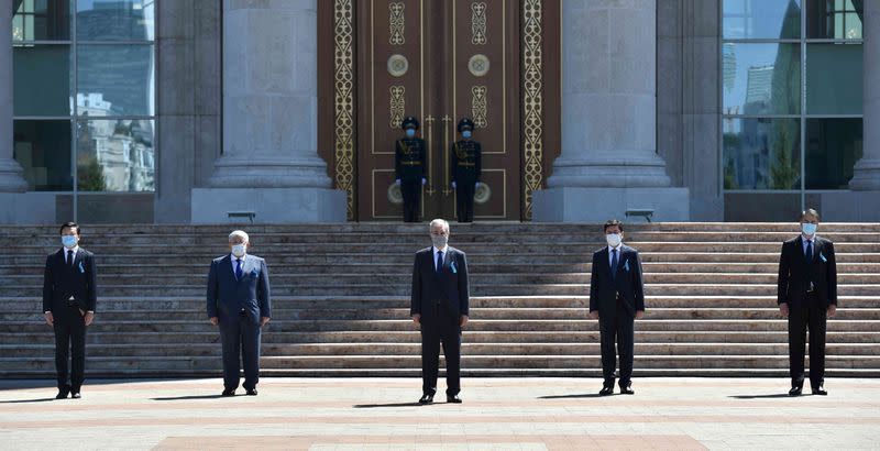 Kazakh President Kassym-Jomart Tokayev observes a minute of silence in memory of the coronavirus disease (COVID-19) victims in Nur-Sultan