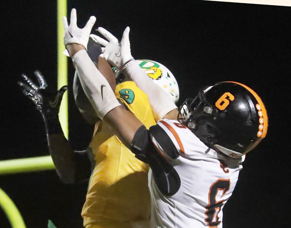 DeLand High's Javon Ross #9 breaks up a pass to Spruce Creek High's Kam Chamble #6, Friday September 29, 2023 in Port Orange.