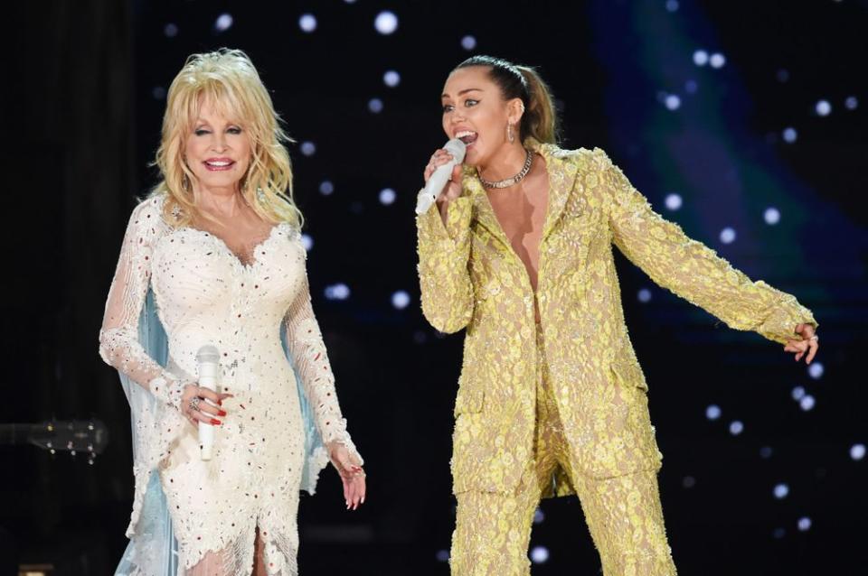 Dolly Parton and Miley Cyrus | Kevin Winter/Getty