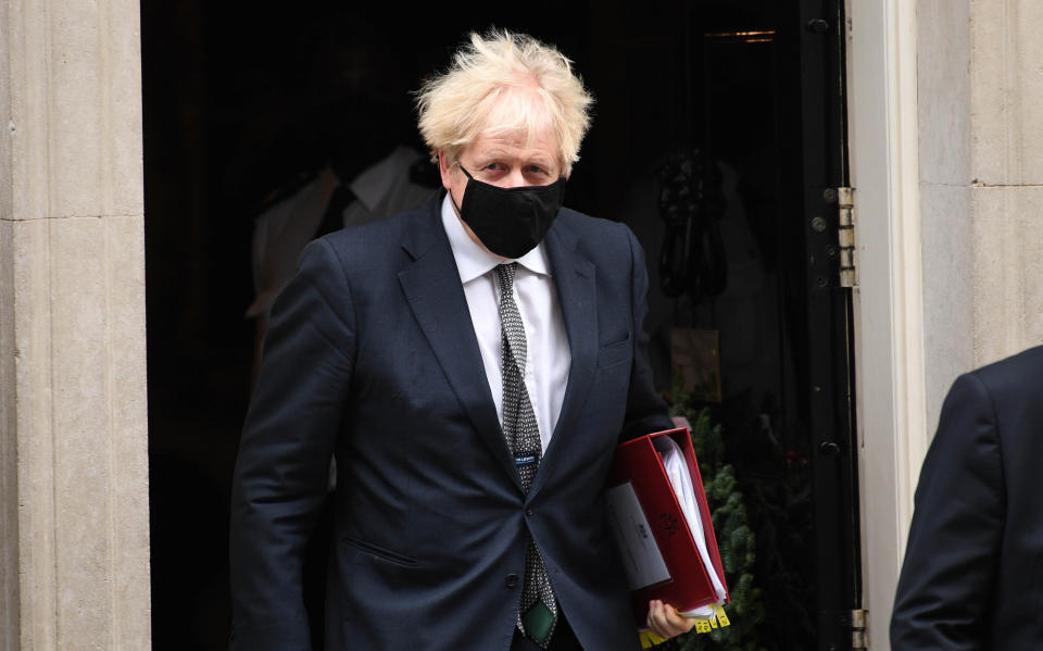 Prime Minister Boris Johnson leaves 10 Downing Street to attend Prime Minister's Questions at the Houses of Parliament, London.