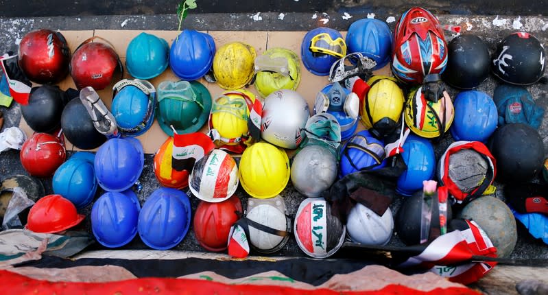 Helmets of the demonstrators who were killed during the ongoing anti-government protests are seen in Baghdad