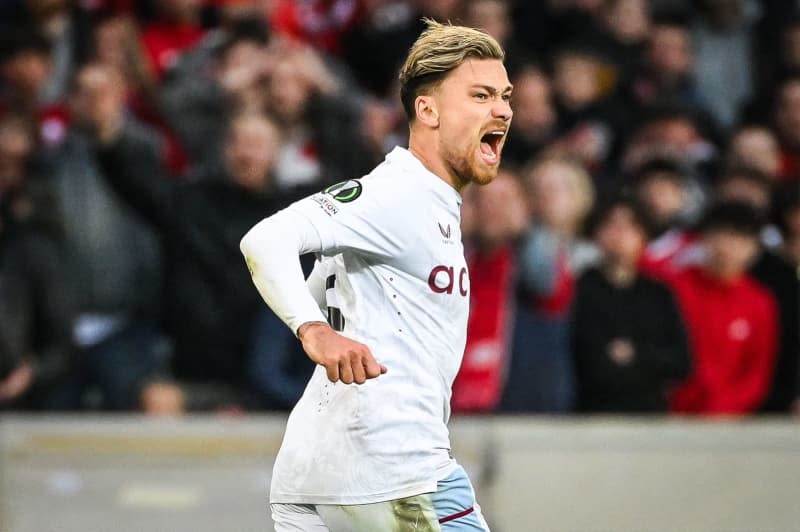 Aston Villa's Matty Cash celebrates scoring his side's first goal during the UEFA Europa Conference League soccer match between Lille OSC and Aston Villa at Pierre Mauroy Stadium. Matthieu Mirville/ZUMA Press Wire/dpa