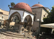 <p>Debris of the collapsed minaret sits around a mosque after an earthquake in Kos on the island of Kos, Greece Friday, July 21, 2017. (Photo: Michael Probst/AP) </p>