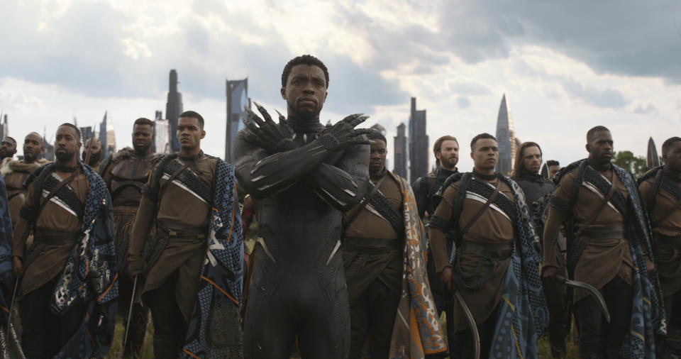 This image released by Disney shows Chadwick Boseman, center, in a scene from Marvel Studios’ “Avengers: Infinity War.” (Marvel Studios via AP)