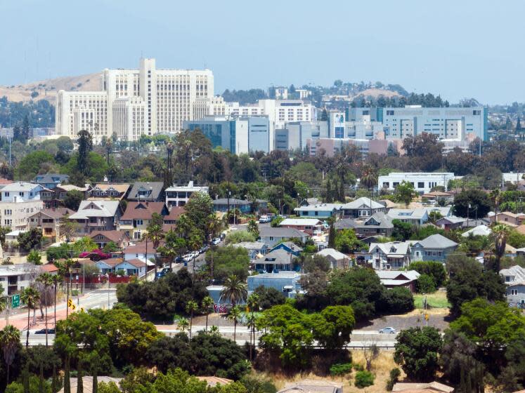 LOS ANGELES, CA - JUNE 20: View of LA General Medical Center. The historic building on the left was damaged in the 1994 Northridge earthquake and now houses a wellness center. A new 600-bed replacement hospital was built to the right. Photographed in Los Angeles, CA on Tuesday, June 20, 2023. (Myung J. Chun / Los Angeles Times)