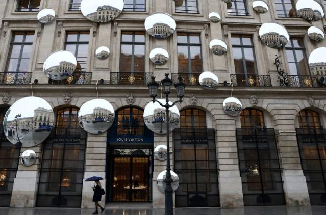 French luxury group Louis Vuitton Moët Hennessy sales, profit hit new highs