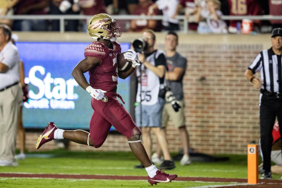 Florida State Seminoles running back Trey Benson (3) scores a touchdown. The Florida State Seminoles defeated the Boston College Eagles 44-14 at Doak Campbell Stadium on Saturday, Sept. 24, 2022.