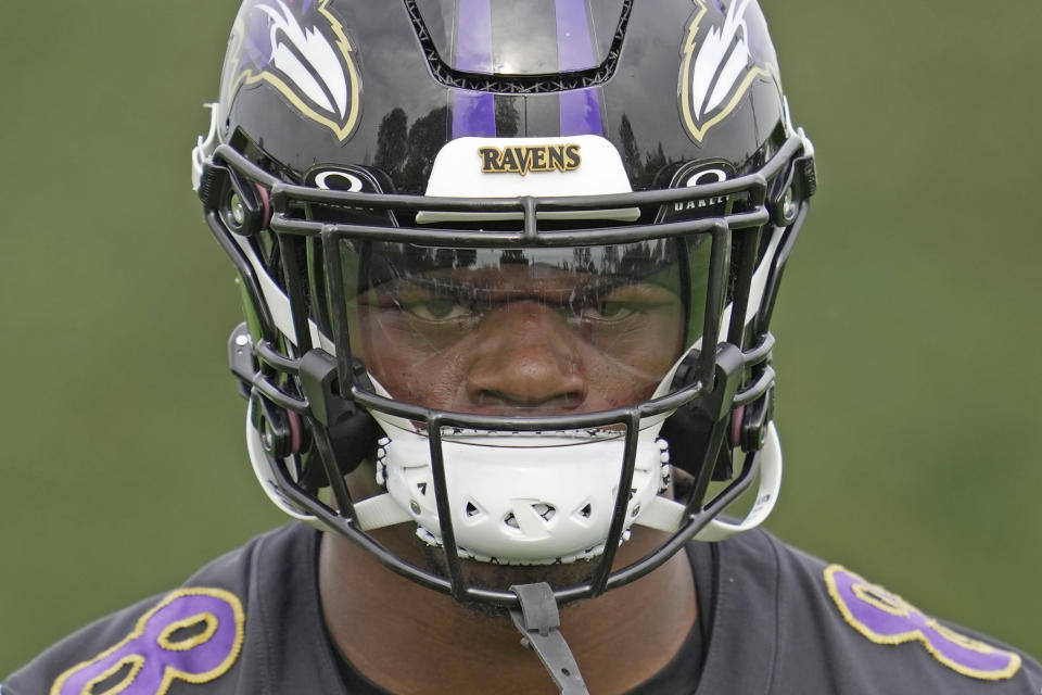Baltimore Ravens quarterback Lamar Jackson (8)attends an NFL practice session in London, Wednesday, Oct. 11, 2023 ahead the NFL game against Tennessee Titans at the Tottenham Hotspur Stadium on Sunday. (AP Photo/Kin Cheung)