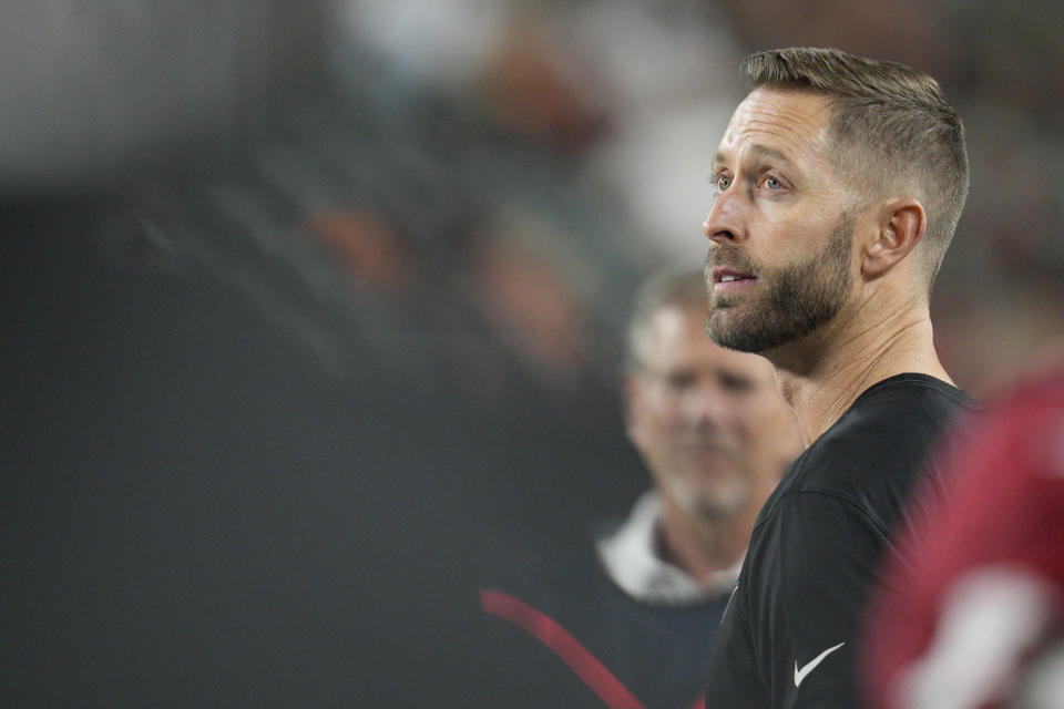 Arizona Cardinals head coach Kliff Kingsbury watches from the sideline as his team plays against the Cincinnati Bengals during the second half of an NFL football preseason game in Cincinnati, Friday, Aug. 12, 2022. (AP Photo/Jeff Dean)