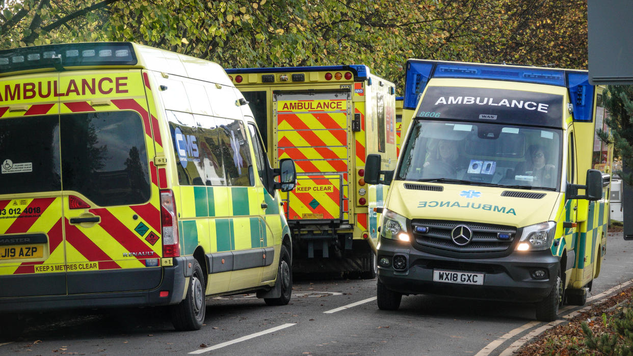 BATH, UNITED KINGDOM - OCTOBER 17: Ambulances queue outside the accident and emergency department of the Bath Royal United Hospital, on October 17, 2022 in Bath, England. The sight of ambulances queueing outside of NHS hospitals are an indication that the whole UK health and social care system is being put under sustained pressure, resulting in longer than expected ambulance wait times for patients.  (Photo by Matt Cardy/Getty Images)