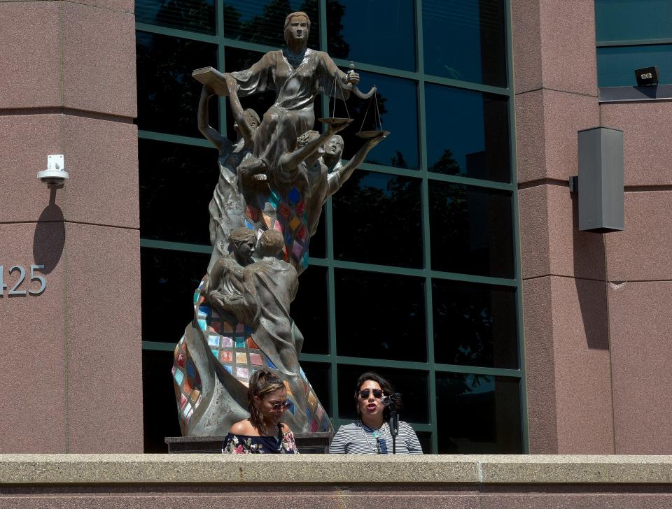 Serene Thin Elk (left) and April Matson (right) from South Dakota Urban Indian Health speak during a protest about abortion rights in front of the Minnehaha County Courthouse on Sunday, July 10, 2022.