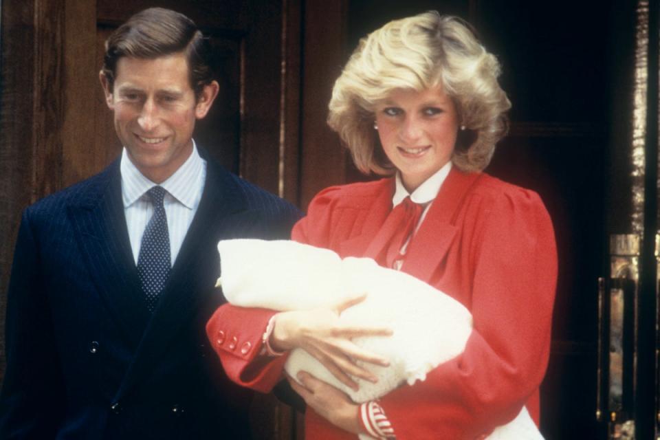 The then Prince and Princess of Wales, Charles and Diana,  leaving hospital with Prince Harry (PA)