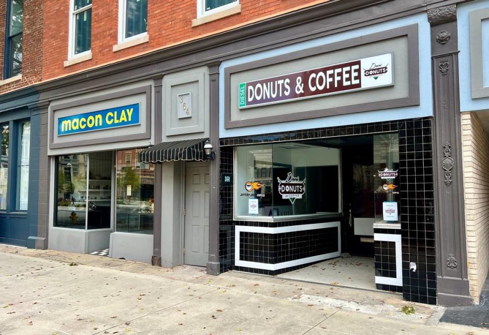 Diesel Donuts put signage on their storefront in downtown Macon in September. The gourmet donut and coffee shop is trying to open its store on Second Street within the next few months.