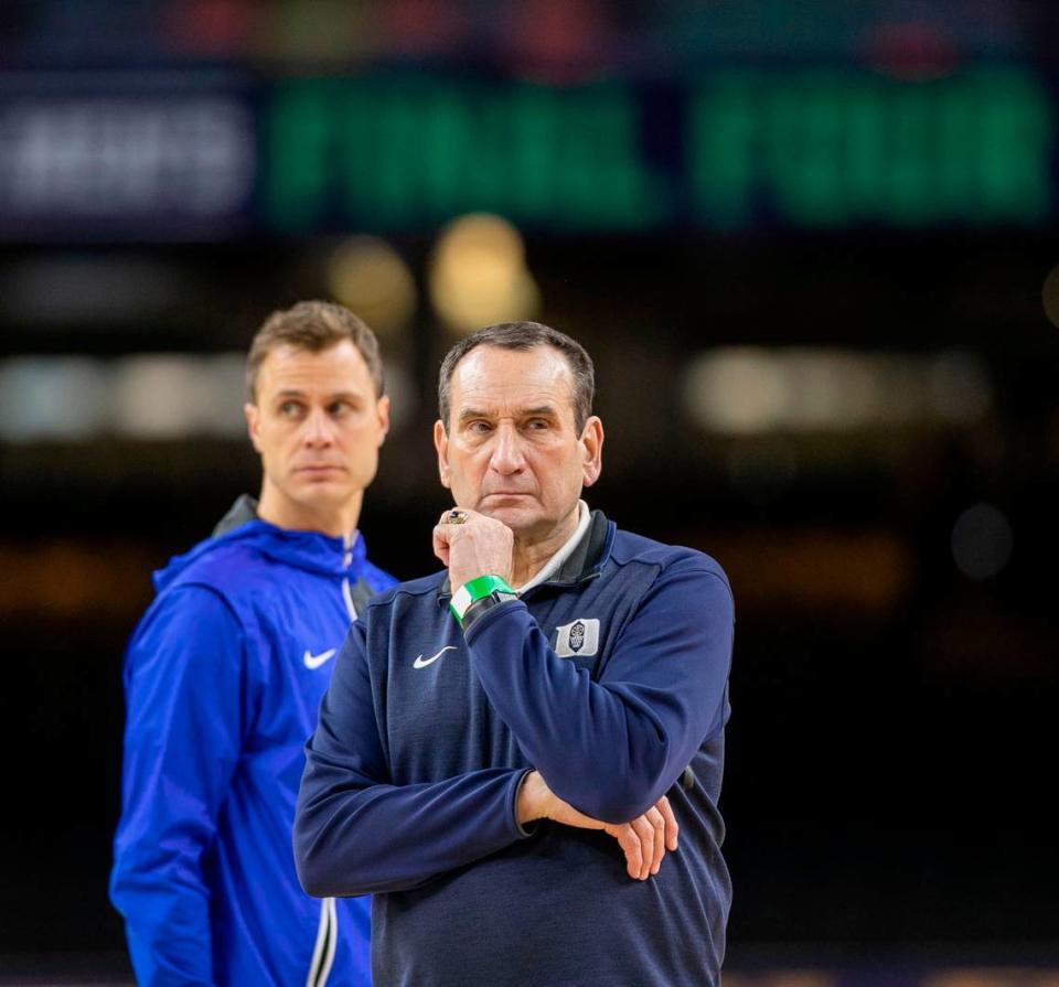 Duke coach Mike Krzyzewski and associate head coach Jon Scheyer watch their players during the Blue Devils’ open practice at the NCAA Final Four on Friday, April 1, 2022 at Caesars Superdome in New Orleans, La.