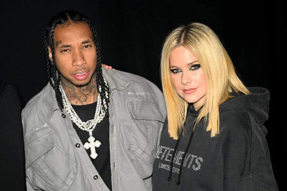 PARIS, FRANCE - MARCH 06:  Tyga and Avril Lavigne attend the Mugler x Hunter Schafer party as part of Paris Fashion Week at Pavillon des Invalides on March 06, 2023 in Paris, France. (Photo by Stephane Cardinale - Corbis/Corbis via Getty Images)