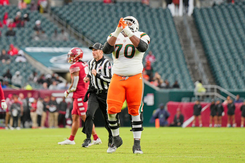 Sep 23, 2023; Philadelphia, Pennsylvania, USA; Miami Hurricanes offensive lineman Javion Cohen (70) celebrates a touchdown in the third quarter against the Temple Owls at Lincoln Financial Field. Mandatory Credit: Andy Lewis-USA TODAY Sports