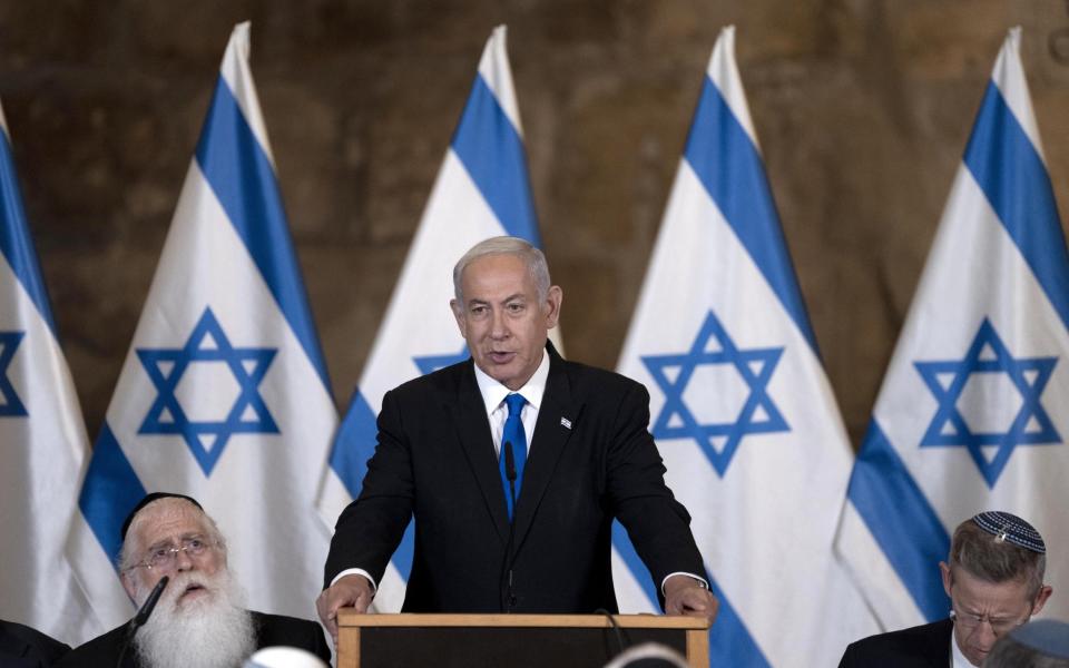 Benjamin Netanyahu speaks at the Israeli weekly cabinet meeting in the Western Wall tunnels in the Old City of Jerusalem - Shutterstock