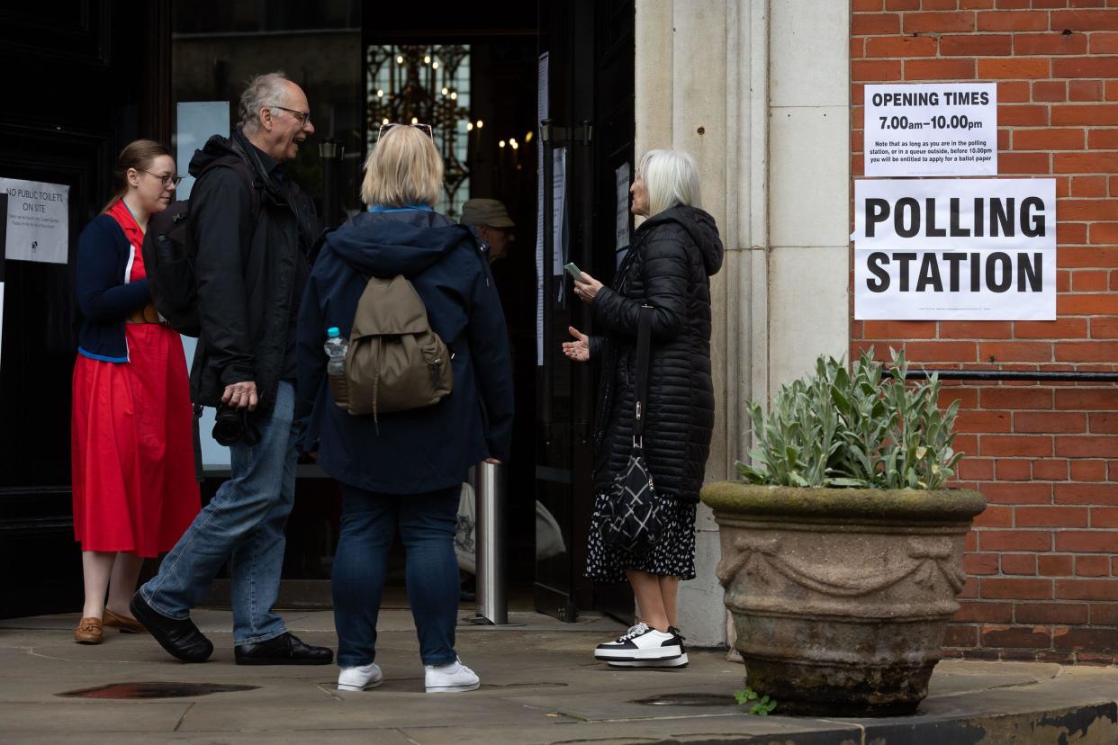 London, UK. 2nd May, 2024. Voters converse outside a polling station in London. Elections are taking place today in 107 local authorities as well as for 11 metro mayors and London Assembly members, with the Conservatives projected to sustain heavy losses. (Credit Image: © Tejas Sandhu/SOPA Images via ZUMA Press Wire) EDITORIAL USAGE ONLY! Not for Commercial USAGE!