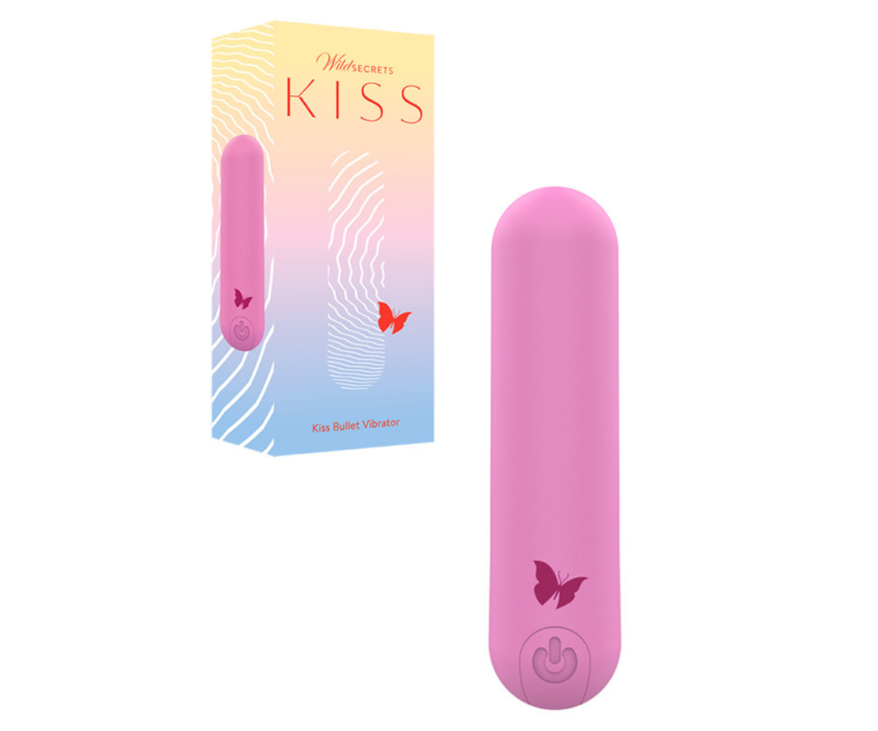 A pale pink silicone bullet vibrator on a white background with the yellow and blue box behind it.