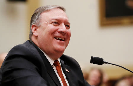 U.S. Secretary of State Mike Pompeo smiles as he testifies at a hearing of the U.S. House Foreign Affairs Committee on Capitol Hill in Washington, U.S., May 23, 2018. REUTERS/Leah Millis