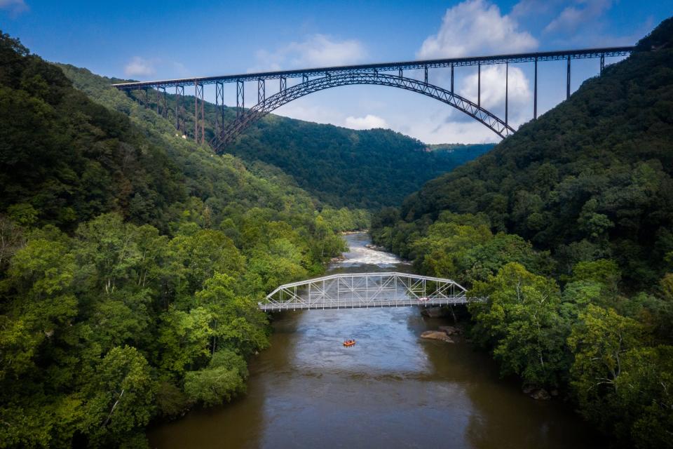 The New River Gorge Bridge, 50 miles southeast of Charleston, West Virginia, is the centerpiece of New River Gorge National Park and Preserve, the nation’s newest national park.