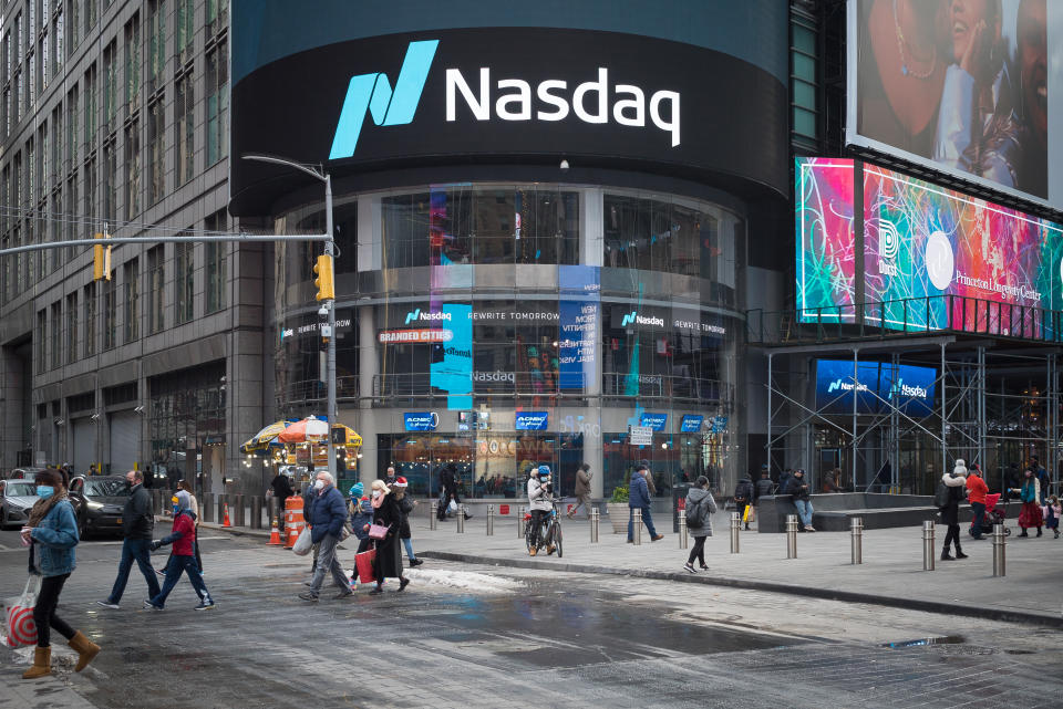 People walking in front of Nasdaq site in Manhattan, New York, US. Photo: Getty